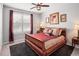 Bedroom features a cozy bed, decorative window and side tables with soft lighting at 10185 Isle St, Parker, CO 80134
