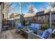 Backyard patio area with conversation set and privacy fence at 723 W 5Th Ave, Denver, CO 80204