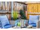 Backyard patio area with conversation set and privacy fence at 723 W 5Th Ave, Denver, CO 80204