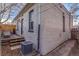 Exterior corner of house features access to patio at 723 W 5Th Ave, Denver, CO 80204