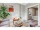 Living room showcasing stylish furnishings and an open doorway to the bedroom at 723 W 5Th Ave, Denver, CO 80204