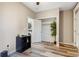 Bedroom area with view to laundry, closet and doorway to common area at 723 W 5Th Ave, Denver, CO 80204