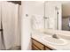 Clean bathroom with a modern vanity and a well-maintained shower and tub at 9411 W 89Th Cir, Westminster, CO 80021