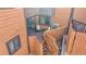 View of the deck and patio area of the home, with wooden railing and sliding glass doors at 9411 W 89Th Cir, Westminster, CO 80021