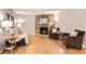 Comfortable living room featuring a stone fireplace and inviting seating area at 9411 W 89Th Cir, Westminster, CO 80021
