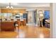An open floor plan connects the kitchen to the living room, enhancing the sense of space at 9411 W 89Th Cir, Westminster, CO 80021