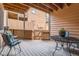 Outdoor patio area perfect for relaxing with chairs and a table near the backyard at 9411 W 89Th Cir, Westminster, CO 80021