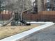 Community playground with a slide and climbing structure for outdoor activities at 9411 W 89Th Cir, Westminster, CO 80021