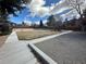 Community playground with benches, recreational area, and open space for outdoor activities and enjoyment at 9411 W 89Th Cir, Westminster, CO 80021