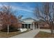 Attractive community pool building with modern architecture, an inviting entrance, and mature landscaping at 19618 Rosewood Ct, Parker, CO 80138