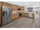 A well-equipped kitchen with stainless steel appliances, sleek flooring, and ample cabinet space at 19618 Rosewood Ct, Parker, CO 80138