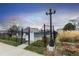 Community pool area featuring a gated entrance, well-maintained landscaping, and neighborhood townhomes at 19618 Rosewood Ct, Parker, CO 80138