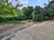 A beautifully landscaped backyard featuring lush greenery and mature trees for a private outdoor oasis at 3661 S Joplin St, Aurora, CO 80013