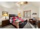 Bedroom with vaulted ceiling, ceiling fan, and plush chair at 50 Cooney Ct, Breckenridge, CO 80424
