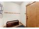 Mud room featuring coat hooks, storage bench, and tile flooring at 50 Cooney Ct, Breckenridge, CO 80424