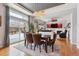 Open concept dining area with sliding glass doors to backyard at 10251 Rifle St, Commerce City, CO 80022