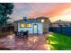 Charming backyard featuring a patio area and well-manicured lawn perfect for entertaining at 2745 N Saint Paul St, Denver, CO 80205