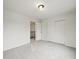 Neutral bedroom featuring a closet and adjacent doorway at 10235 Rustic Redwood Ln, Highlands Ranch, CO 80126