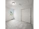 Neutral bedroom featuring a closet and bright daylight at 10235 Rustic Redwood Ln, Highlands Ranch, CO 80126