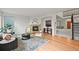 Bright living room with a cozy fireplace and stylish decor at 10235 Rustic Redwood Ln, Highlands Ranch, CO 80126