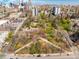Scenic aerial view of Governors' Park and downtown Denver, highlighting green space and urban living at 325 E 7Th Ave, Denver, CO 80203