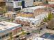 Aerial view of the neighborhood with residential homes and commercial establishments including Trader Joe's at 325 E 7Th Ave, Denver, CO 80203