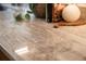 Close-up of the countertop, highlighting the marble-like pattern and smooth surface at 325 E 7Th Ave, Denver, CO 80203