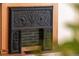 Close up of a vintage fireplace with ornate details and classic style at 325 E 7Th Ave, Denver, CO 80203
