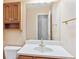 Bathroom features vanity, mirror, and modern fixtures at 6143 E Hinsdale Ave, Centennial, CO 80112