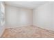 Bright bedroom features neutral carpet, a window with blinds, and light-colored walls at 6143 E Hinsdale Ave, Centennial, CO 80112