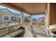 Relaxing outdoor patio with comfortable seating and a grill at 22870 E Chenango Ave, Aurora, CO 80015