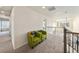 Bright hallway with seating and natural light, perfect for a reading nook or relaxation area at 22870 E Chenango Ave, Aurora, CO 80015