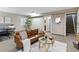 Spacious basement with seating area and stairs at 25 Canongate Ln, Highlands Ranch, CO 80130