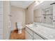 Bathroom with modern sink, vanity, and tiled shower at 6495 E Happy Canyon Rd # 171, Denver, CO 80237