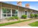 Charming townhouse showcasing mature landscaping, a well-kept walkway, and cozy, welcoming facade at 6495 E Happy Canyon Rd # 171, Denver, CO 80237