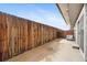 Outdoor patio area featuring a wood fence and concrete floors at 6495 E Happy Canyon Rd # 171, Denver, CO 80237