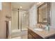 Clean bathroom with shower/tub combo, vanity, and mirror at 3607 Mariposa St, Denver, CO 80211