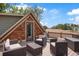 Rooftop deck features seating area and access door at 3607 Mariposa St, Denver, CO 80211