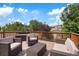 Relaxing rooftop deck with seating and city views at 3607 Mariposa St, Denver, CO 80211