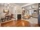 Bright dining room with hardwood floors and modern light fixture at 3607 Mariposa St, Denver, CO 80211