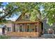 Charming craftsman home with a welcoming porch and modern fenced yard at 3607 Mariposa St, Denver, CO 80211