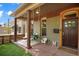 Inviting front porch with seating area, perfect for relaxing at 3607 Mariposa St, Denver, CO 80211