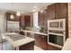 Modern kitchen with stainless steel appliances and an island at 3607 Mariposa St, Denver, CO 80211