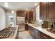 Modern kitchen with stainless steel appliances and granite countertops at 3607 Mariposa St, Denver, CO 80211