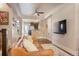 Open living room with hardwood floors and a view of the kitchen at 3607 Mariposa St, Denver, CO 80211