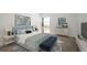 Stylishly furnished bedroom with ample natural light and modern decor at 7865 E Mississippi Ave # 608, Denver, CO 80247