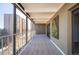 Hallway with carpet, an interesting piece of art, and large windows with city views at 7865 E Mississippi Ave # 608, Denver, CO 80247