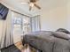 Cozy bedroom with a comfortable bed and plenty of closet space at 2095 S Knox Ct, Denver, CO 80219