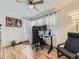 Functional home office with a standing desk and ample natural light at 2095 S Knox Ct, Denver, CO 80219