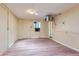 Basement featuring laminate floors, neutral paint, and utilities hook ups at 2022 S Clay St, Denver, CO 80219